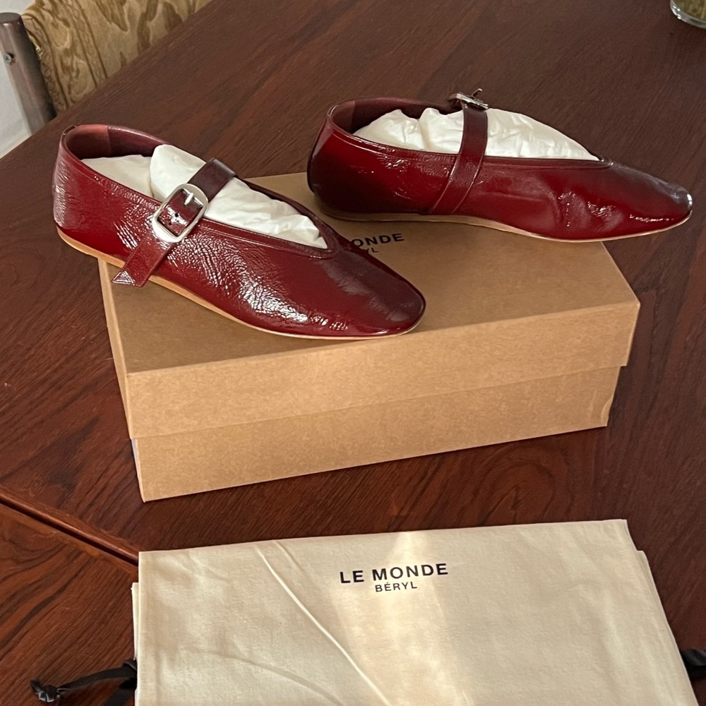 Red Flats & Loafers with Rounded Toe and Decorative Element